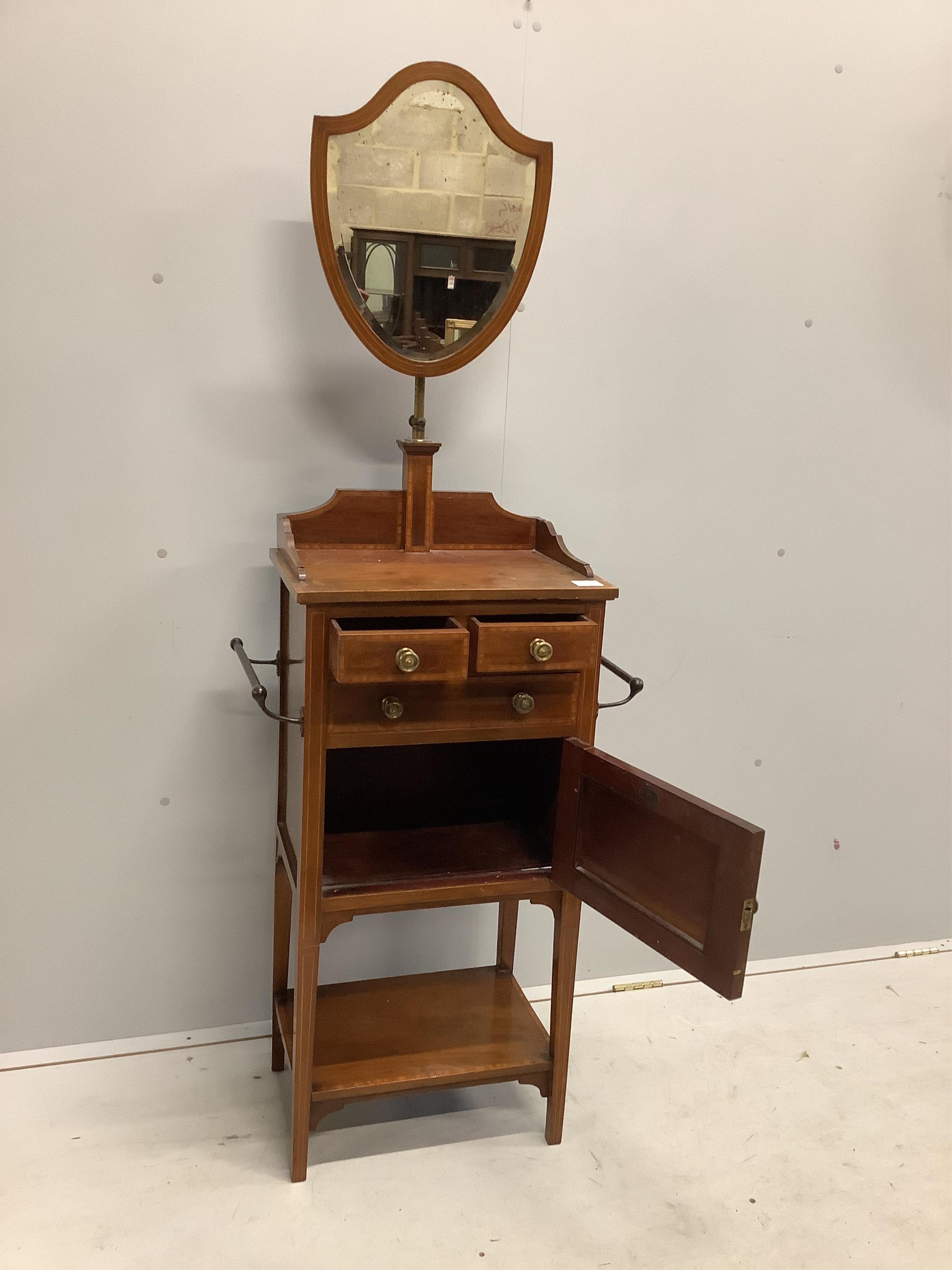 An Edwardian Sheraton revival mahogany and satinwood banded mahogany wash stand, width 58cm, depth 34cm, height 160cm. Condition - fair